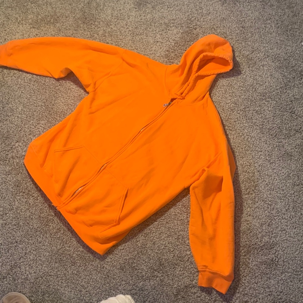 Bright orange zip up hoodie